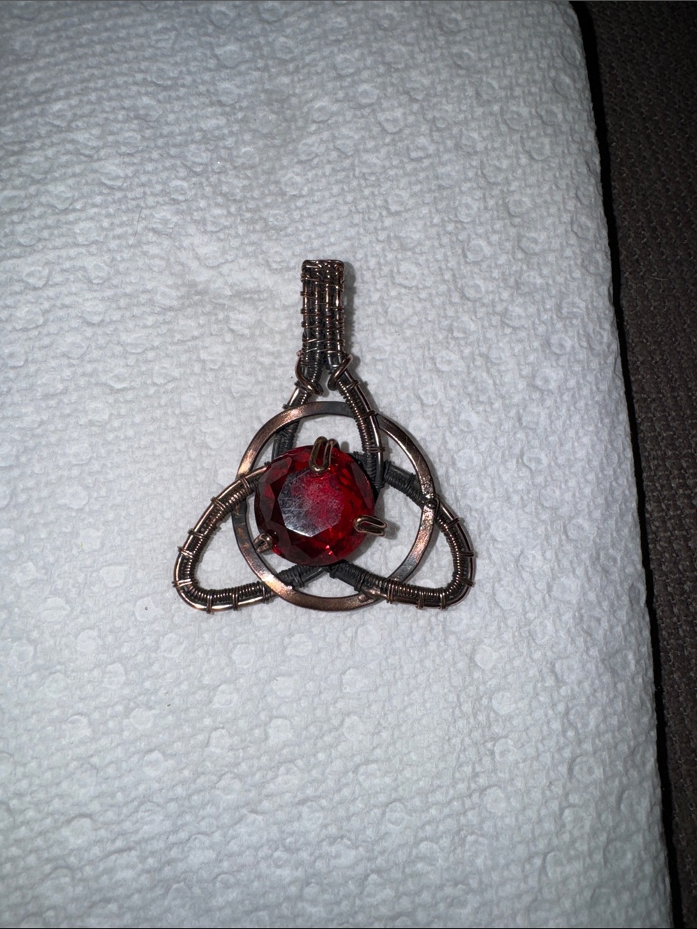 Handcrafted Copper Wire Pendant with faceted red garnet stone